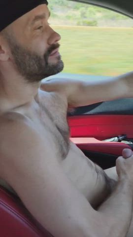 Getting my cock nice and juicy in the backseat before my bud and I hit the nude beach.