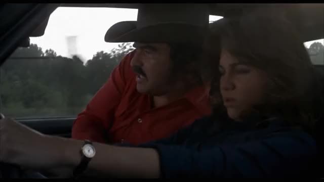 Smokey-and-the-Bandit-1977-GIF-00-48-20-switching-seats