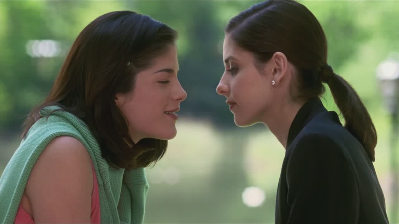 Selma Blair & Sarah Michelle Gellar sharing tongue.