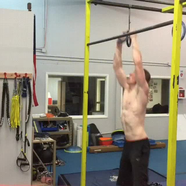 Pull-up using a ring balanced on a bar