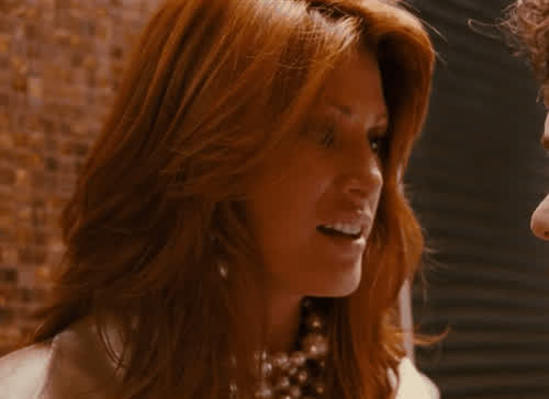 Angie Everhart's freckled plots in Take Me Home Tonight