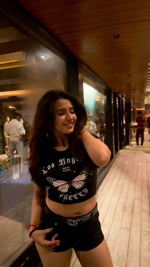 Roshni Walia in crop top and shorts