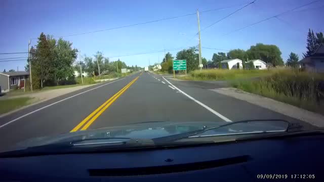 Truck suddenly loses control and flips up onto a house - Sudbury, Ontario, Canada