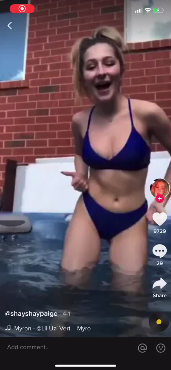 sexy young teen hoe dancing and showing off her nice body in blue bikini shaking
