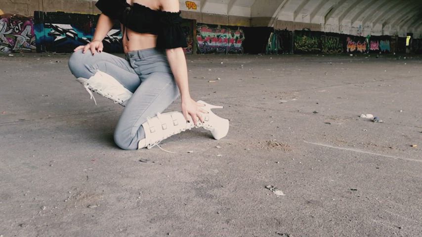 White PVC Buckle Boots and Tight Jeans