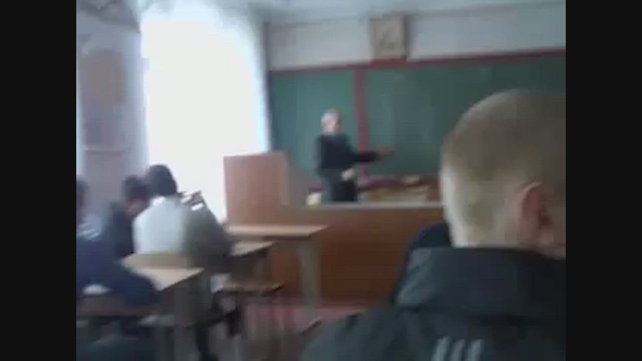 Sneaky handjob in the back of the classroom