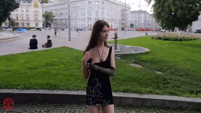 Voyeur brunette flashing tits in public park of Vienna