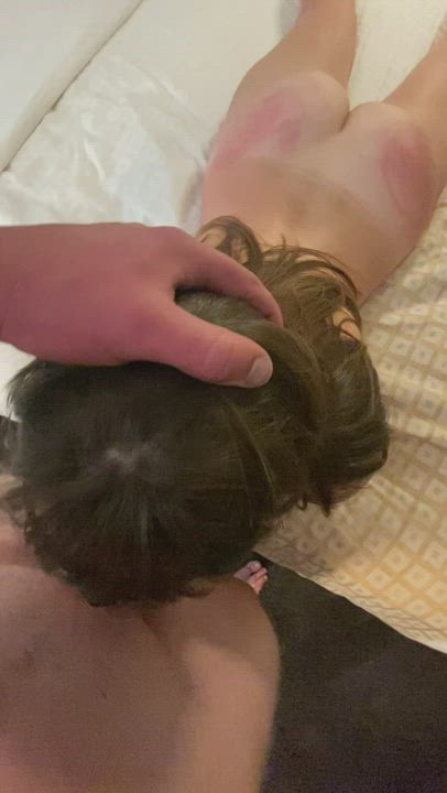 Shoving my cock down this blindfolded sluts throat as I spank her.