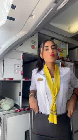 big tits brunette dancing dress stewardess tease teasing uniform clip