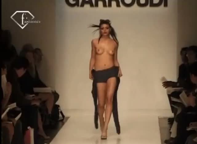 Topless on runway