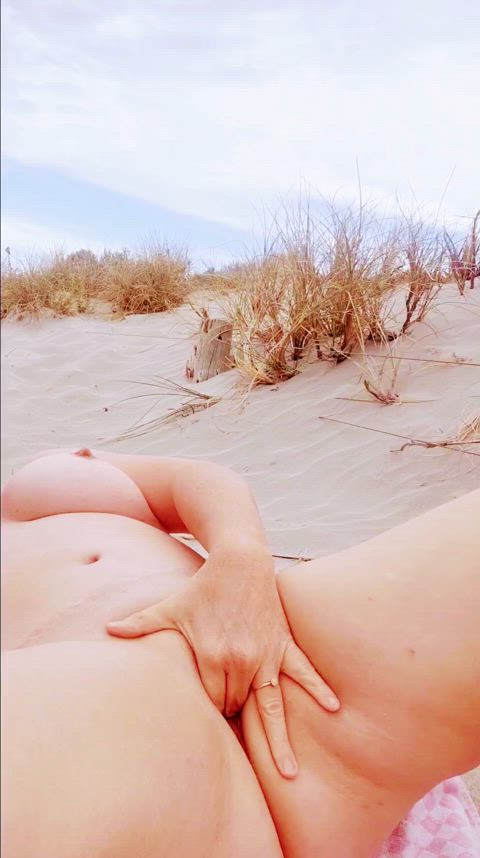 Nude and squirting on the beach!