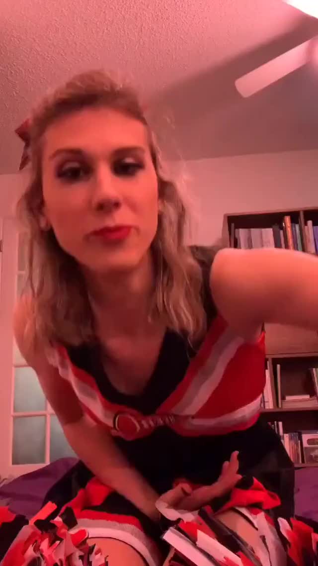 Beautiful cheerleader strokes her cock. @WonderTease (gif)