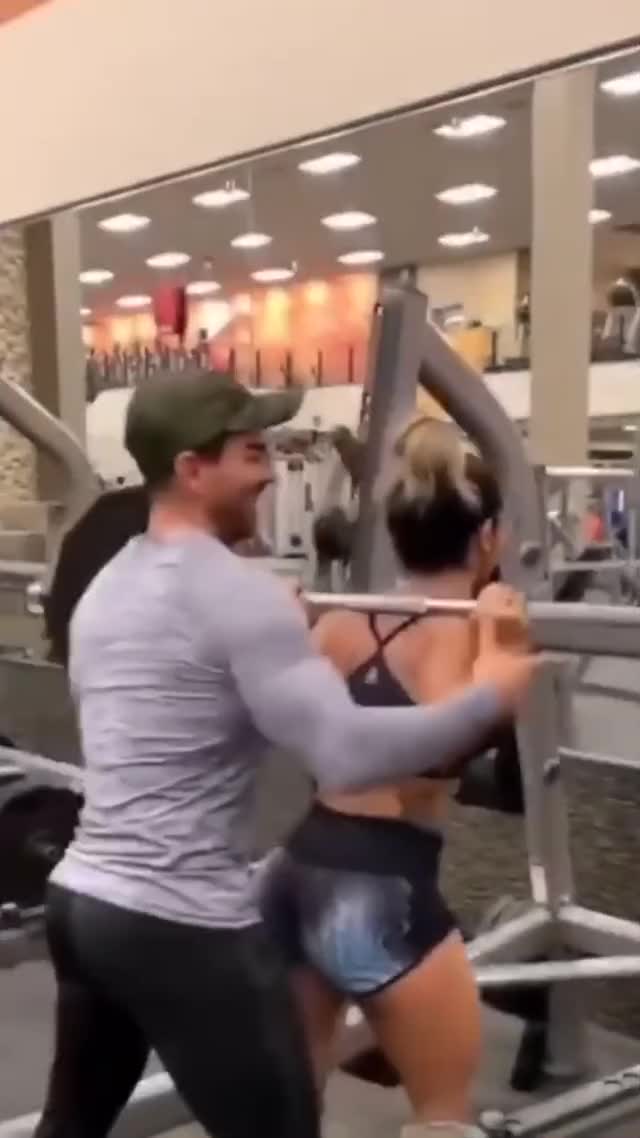 Horny personal trainer grabs his sexy clients body and ass