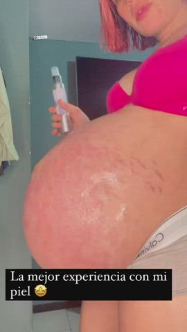 belly button latina lingerie oil oiled pink pregnant rubbing clip