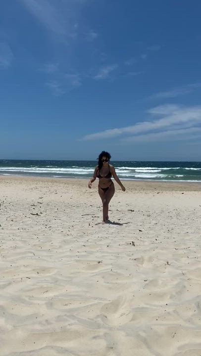 trying to avoid tan lines by flashing at the beach :P