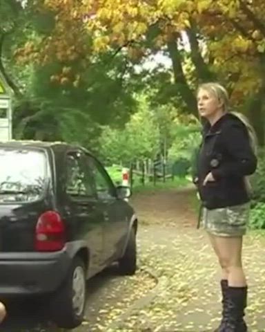 Germany girl pee between two cars