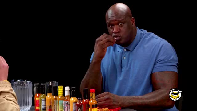 Shaq Tries to Not Make a Face While Eating Spicy Wings | Hot Ones