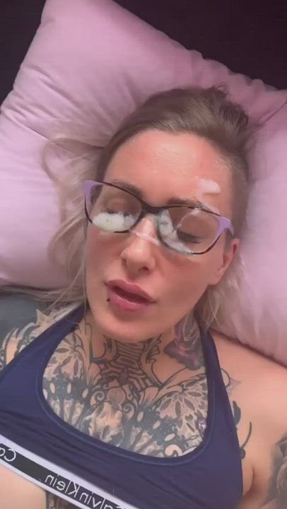 Tattooed hottie licking cum off her glasses