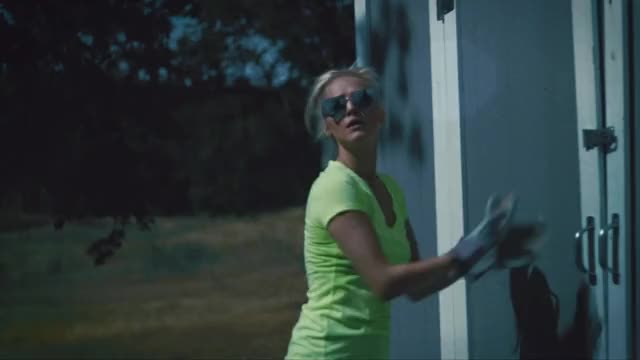 Emily Sweet - The Dragon Unleashed (2019) - talking/walking outside in neon shirt