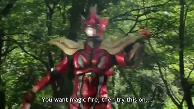 Kamen Rider Wizard keeps fighting after blast from Phoenix