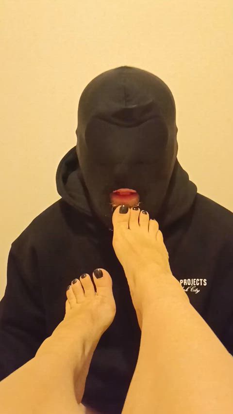 Slave S getting some foot time. Would you do a better job cleaning my feet? 