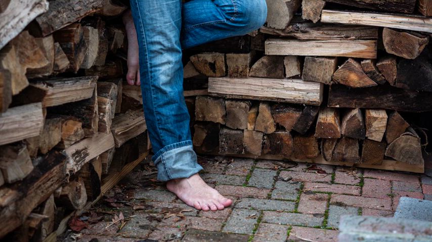 "Dancing" by the wood pile with bare feet!