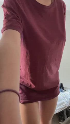 Busty lil sis taking off her shirt