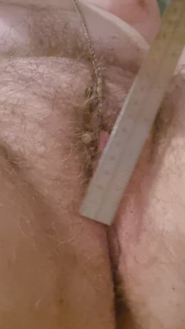 Slapping my clamped clit with a sharp metal ruler