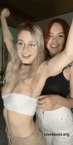 Blonde And redhead coeds flashing tits