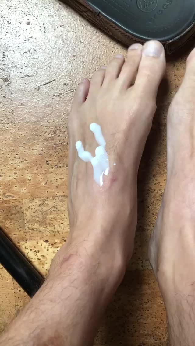 Rubbing in some lotion with just my size 13 feet (gif)